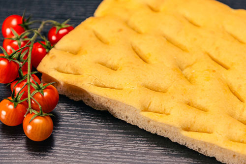 precooked focaccia on trays